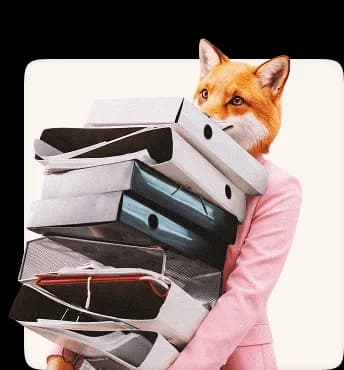 Fox creative professional carrying a large stack of folders and project files
