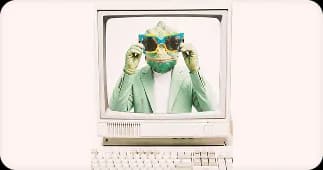 Chameleon creative professional wearing sunglasses inside a retro computer screen