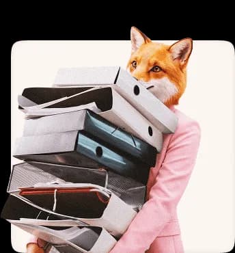 Fox creative professional carrying a large stack of folders and project files